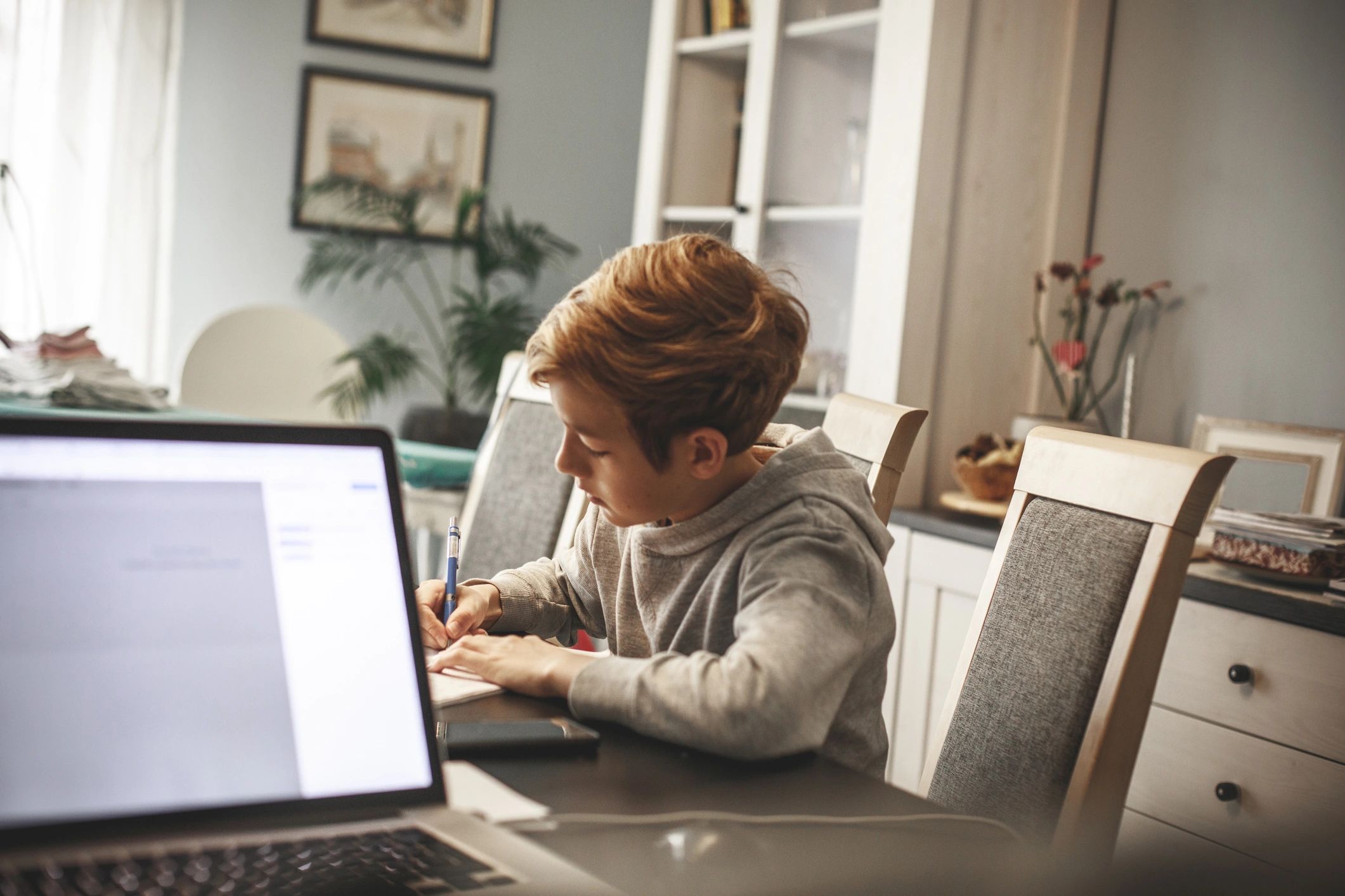 Student completing schoolwork at home