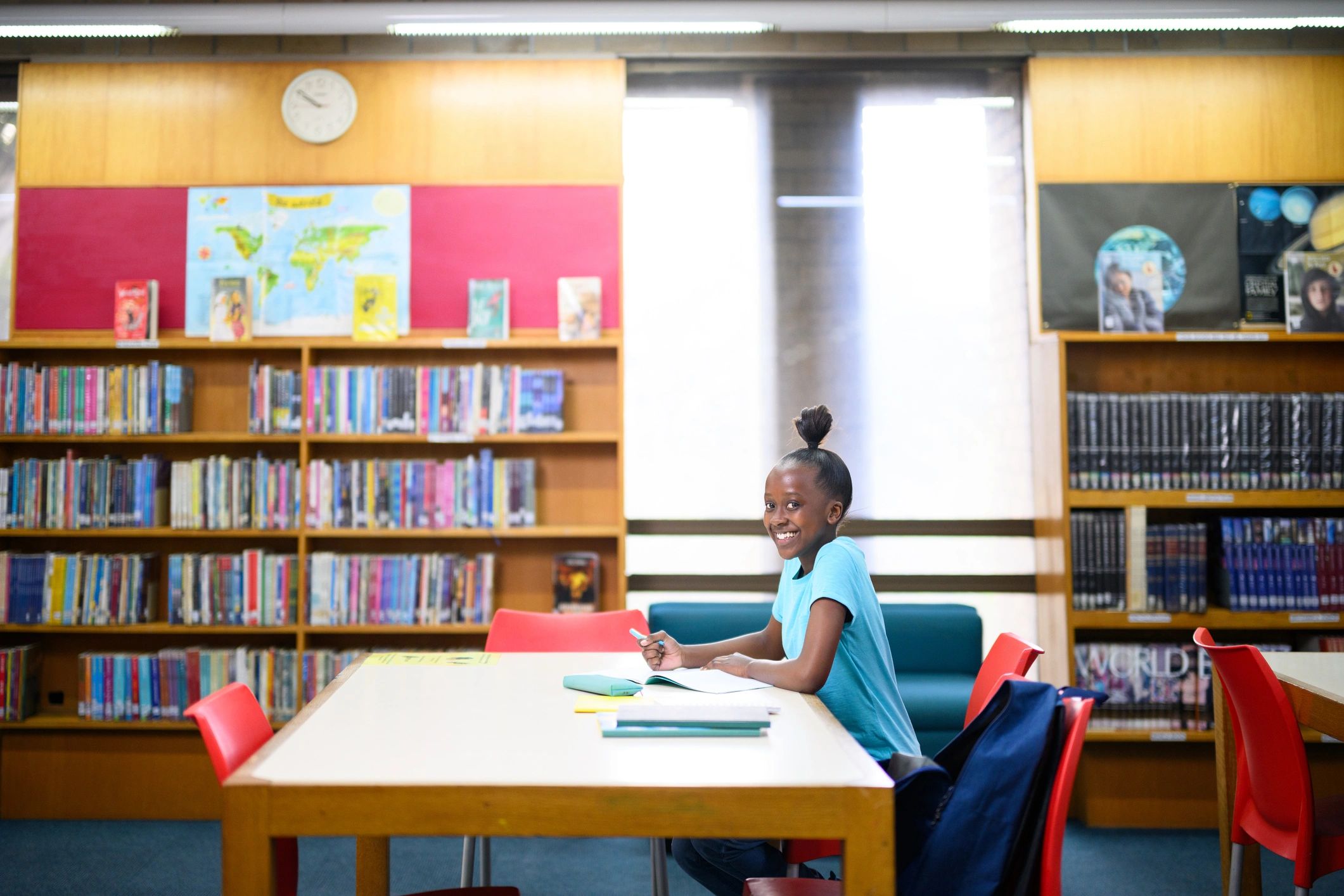 Student studying independently in a library